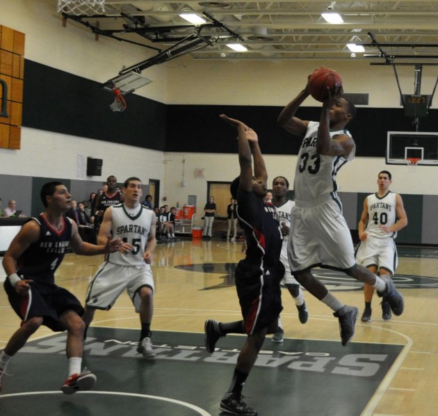 Men’s basketball team steamrolls over New England College