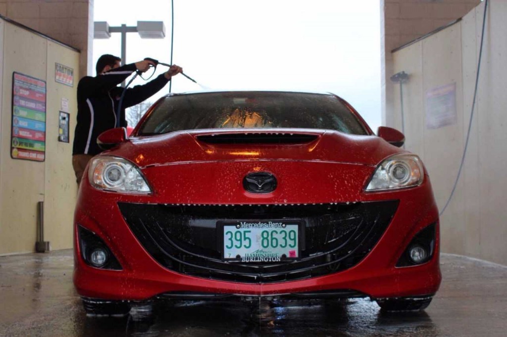 The man in the red Mazda