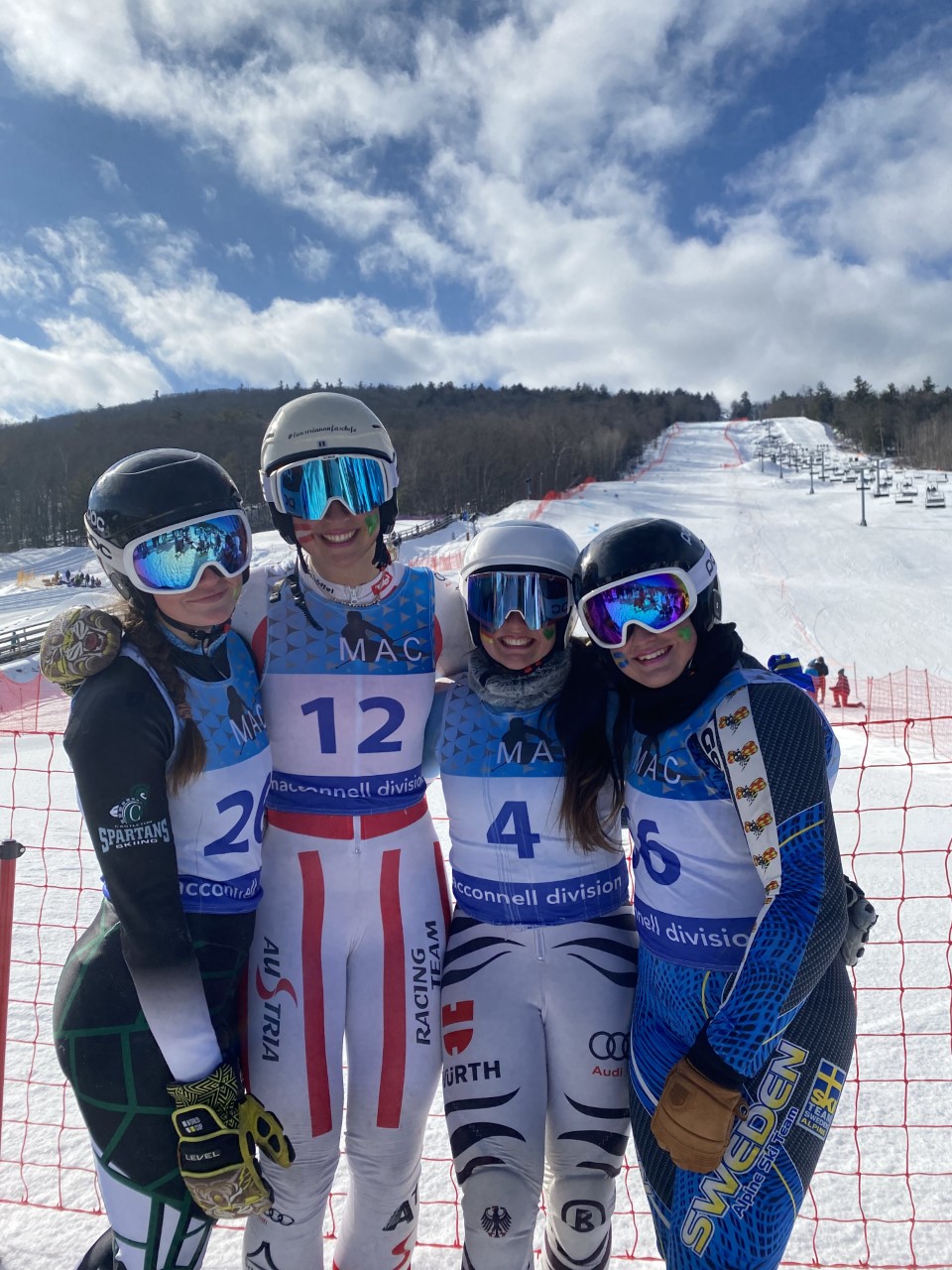 International skiers bond team