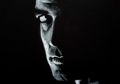 Drawing George Clooney in reverse charcoal