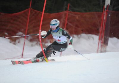 Alpine ski team flying out the gates